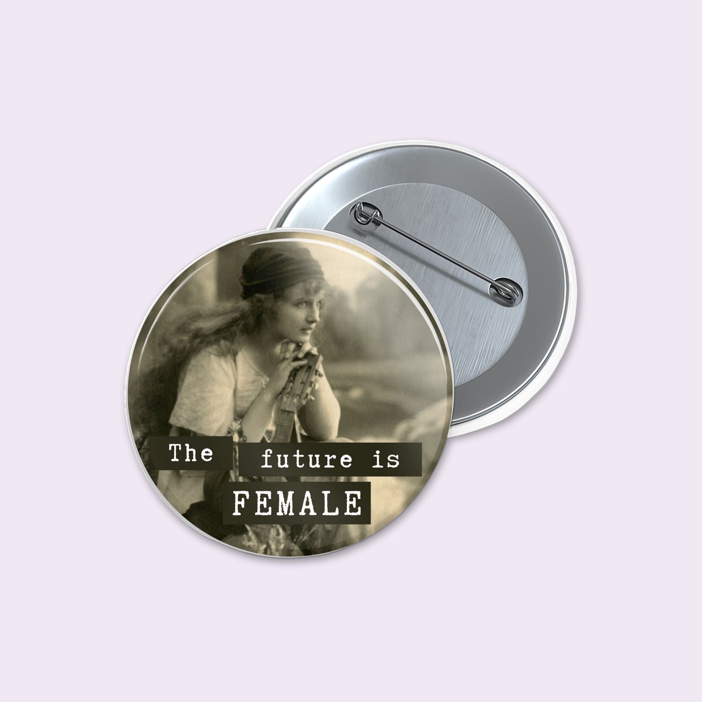 Round pinback button displays a sepia-toned vintage photograph of a woman with the text 'The future is FEMALE' in white lettering.
