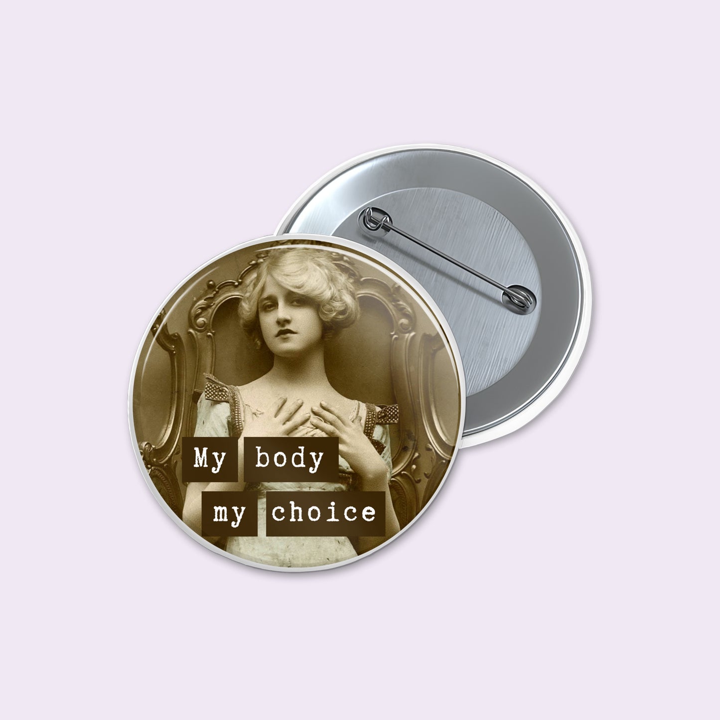 Round pinback button shows a sepia-toned vintage portrait of a woman with the text 'My body my choice' in white lowercase letters.