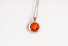 Glass cabochon pendant with orange marigold flower - Whimsy Spirit Shop