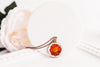 Glass cabochon pendant with orange marigold flower - Whimsy Spirit Shop