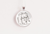 Cat mom necklace for book lovers featuring a black line drawing of a cat leaning against a pillow and reading a book 