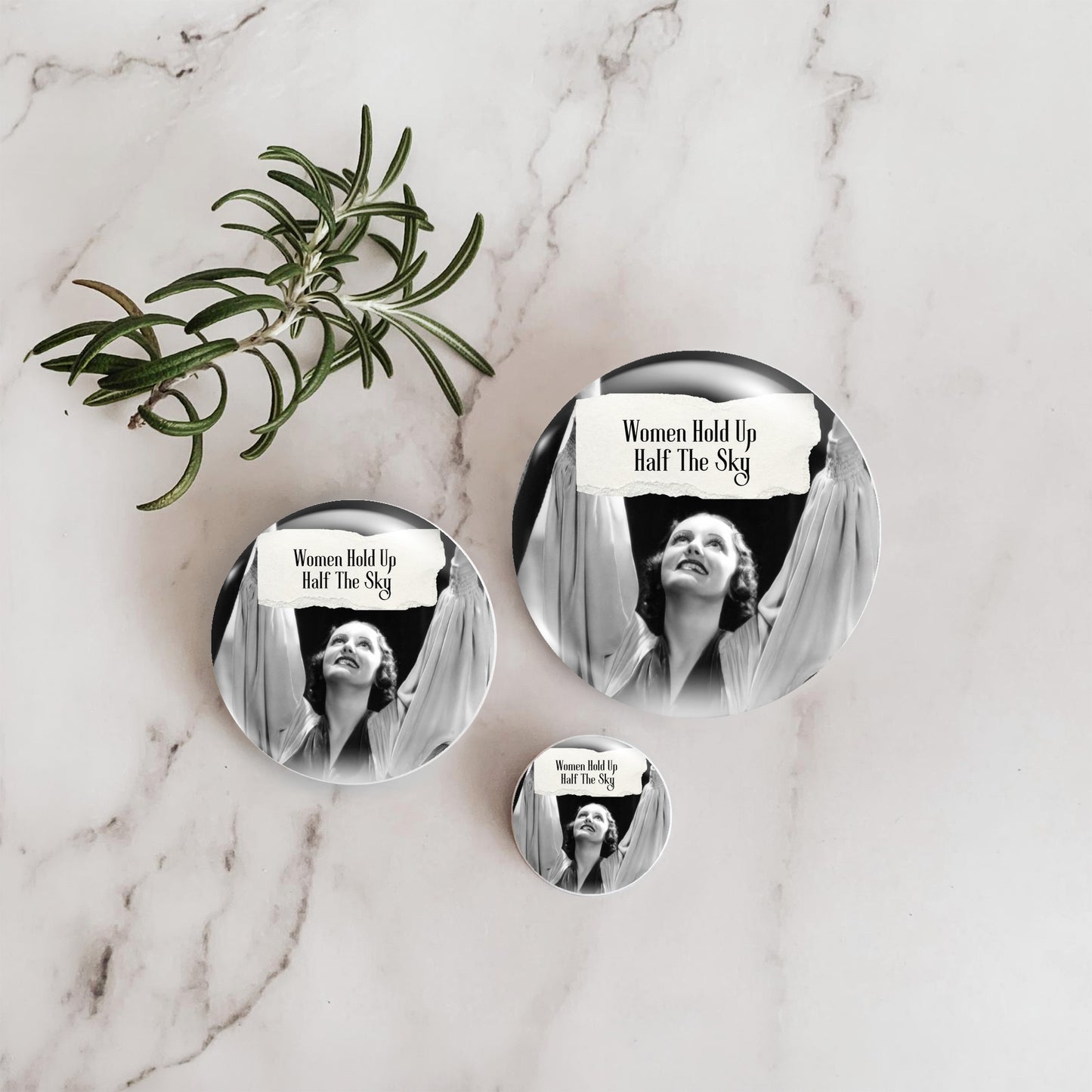 Feral retro woman pin back button with quote that says "Women Hold Up Half The Sky" with three sizes represented