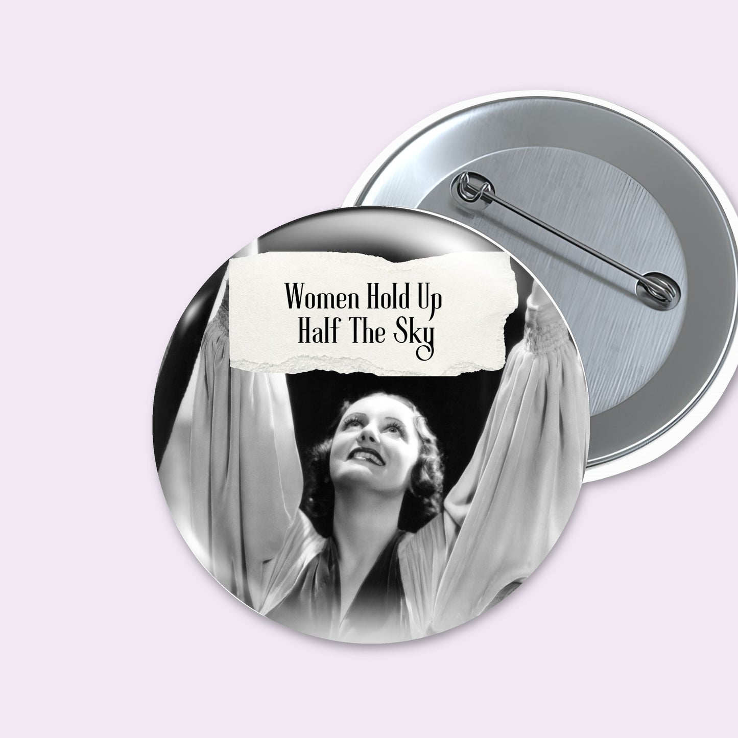 Feral retro woman pin back button with quote that says "Women Hold Up Half The Sky" 