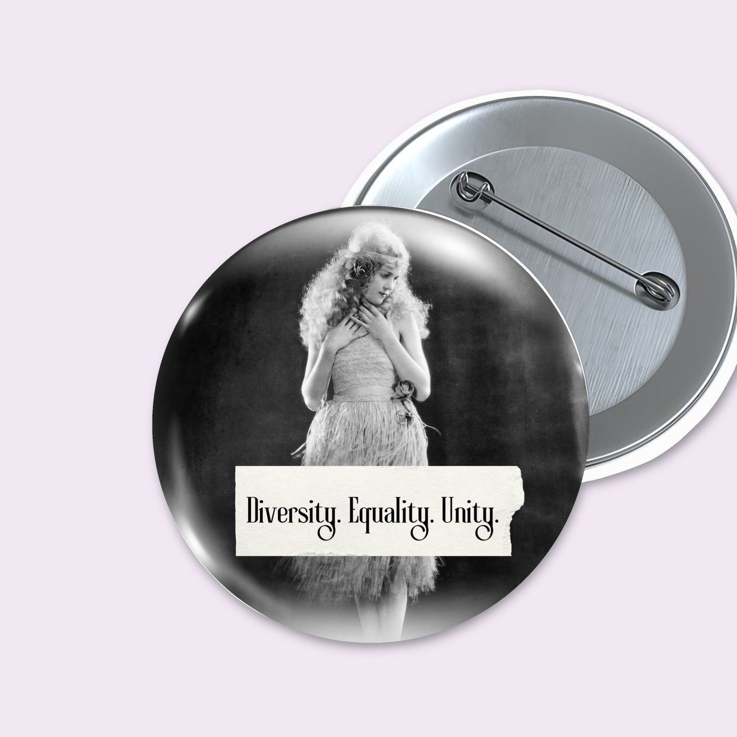 Retro woman on a pin back button with writing "Diversity. Equality. Unity." 