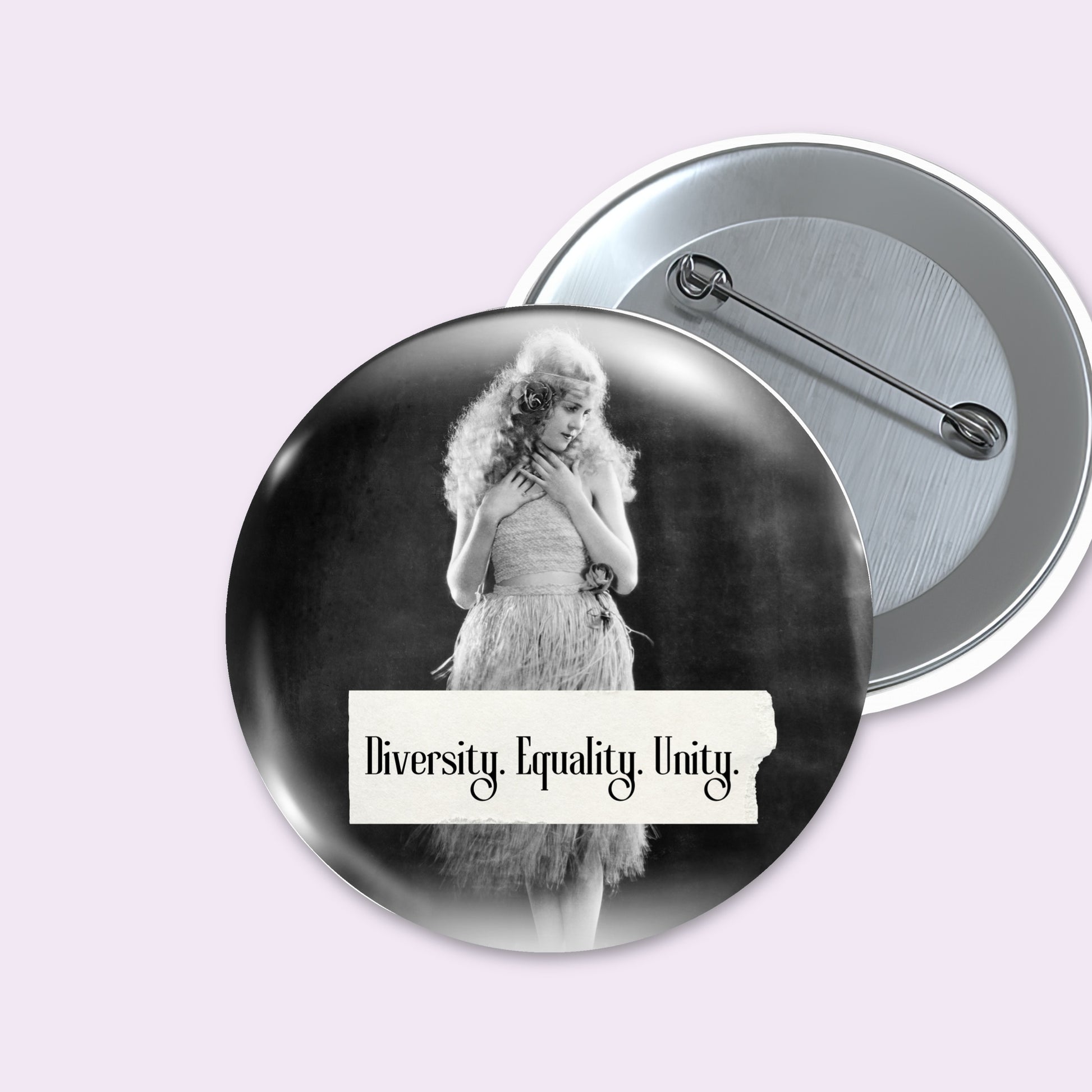Retro woman on a pin back button with writing "Diversity. Equality. Unity." 