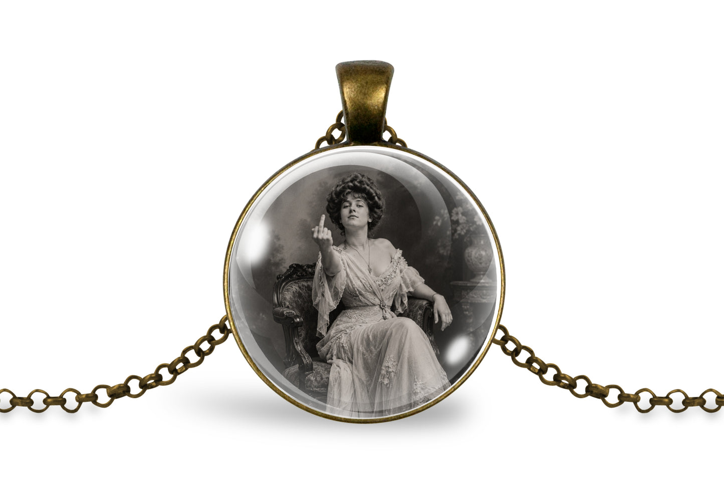 An antique style bronze-plated round pendant necklace featuring a vintage black and white photograph of a seated woman, suspended from a matching antique bronze chain on a white background.