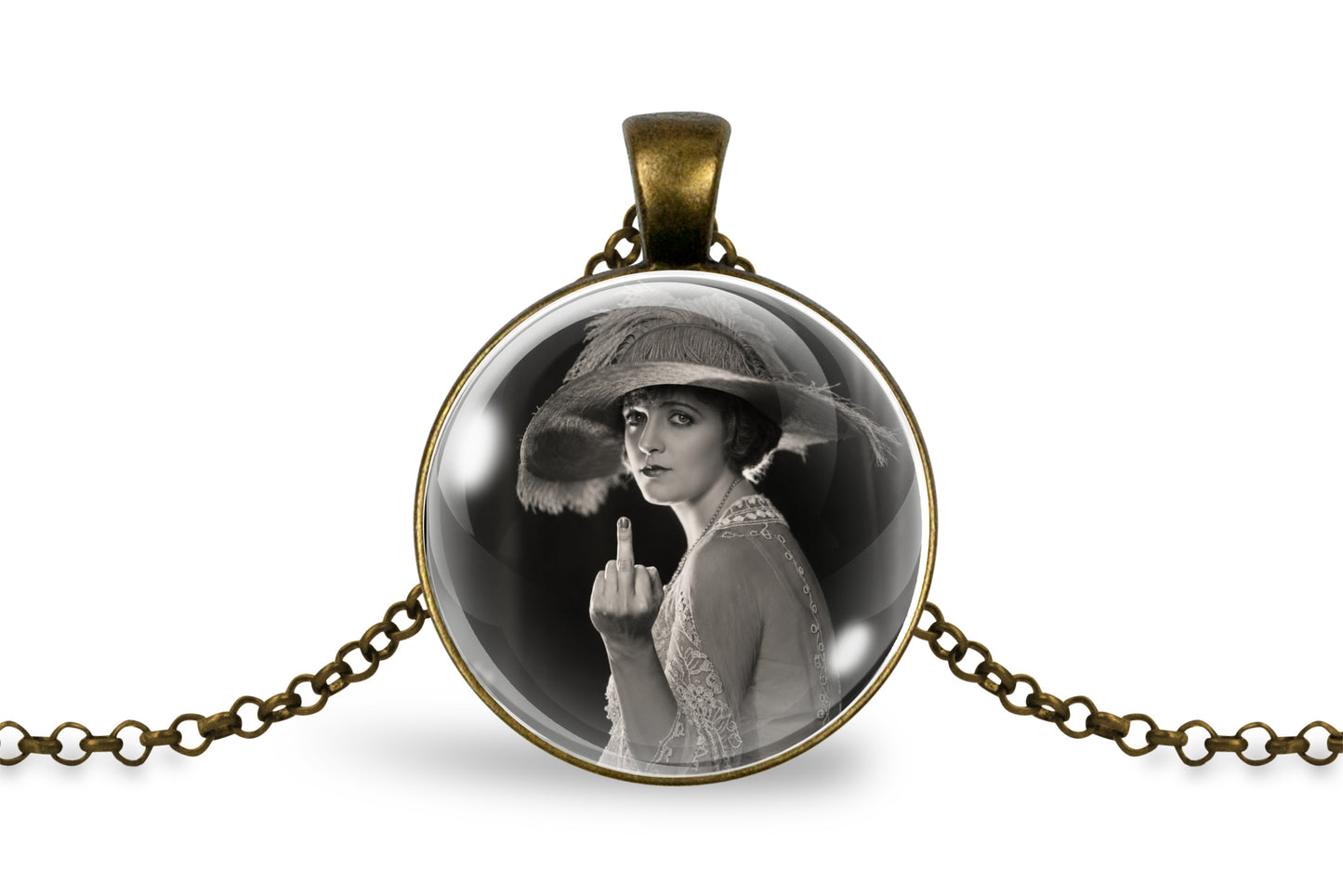 An antique bronze pendant necklace featuring a black and white vintage photograph of a woman in a hat, suspended on a matching chain against a white background.