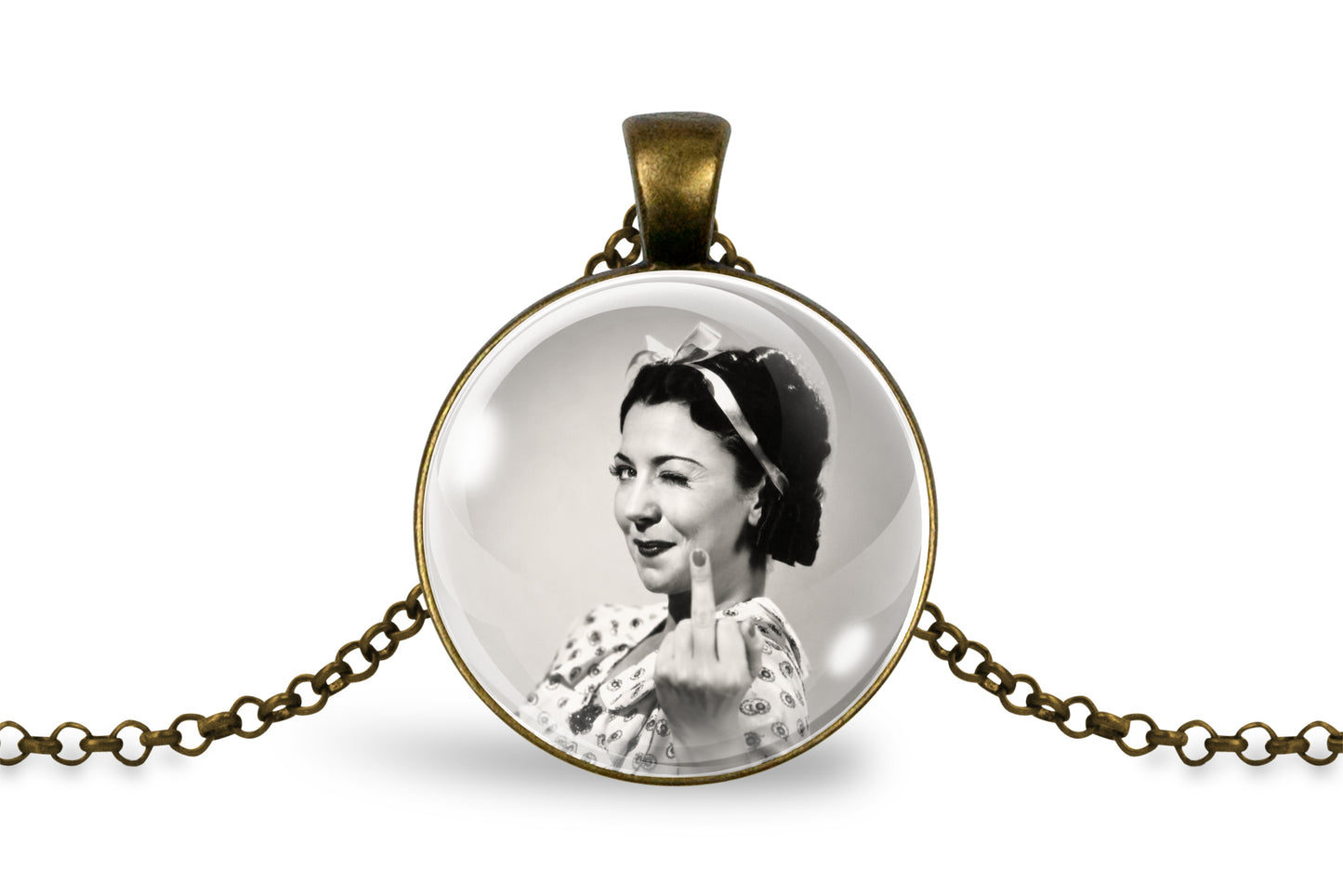 A round pendant necklace featuring a black-and-white vintage portrait of a woman making a middle finger gesture, set in an antique bronze-toned metal pendant with a matching chain on a white background.