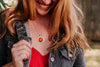 Glass cabochon pendant with orange marigold flower - Whimsy Spirit Shop