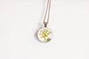 February birth flower necklace featuring yellow primrose in a bronze-plated setting - Whimsy Spirit Shop