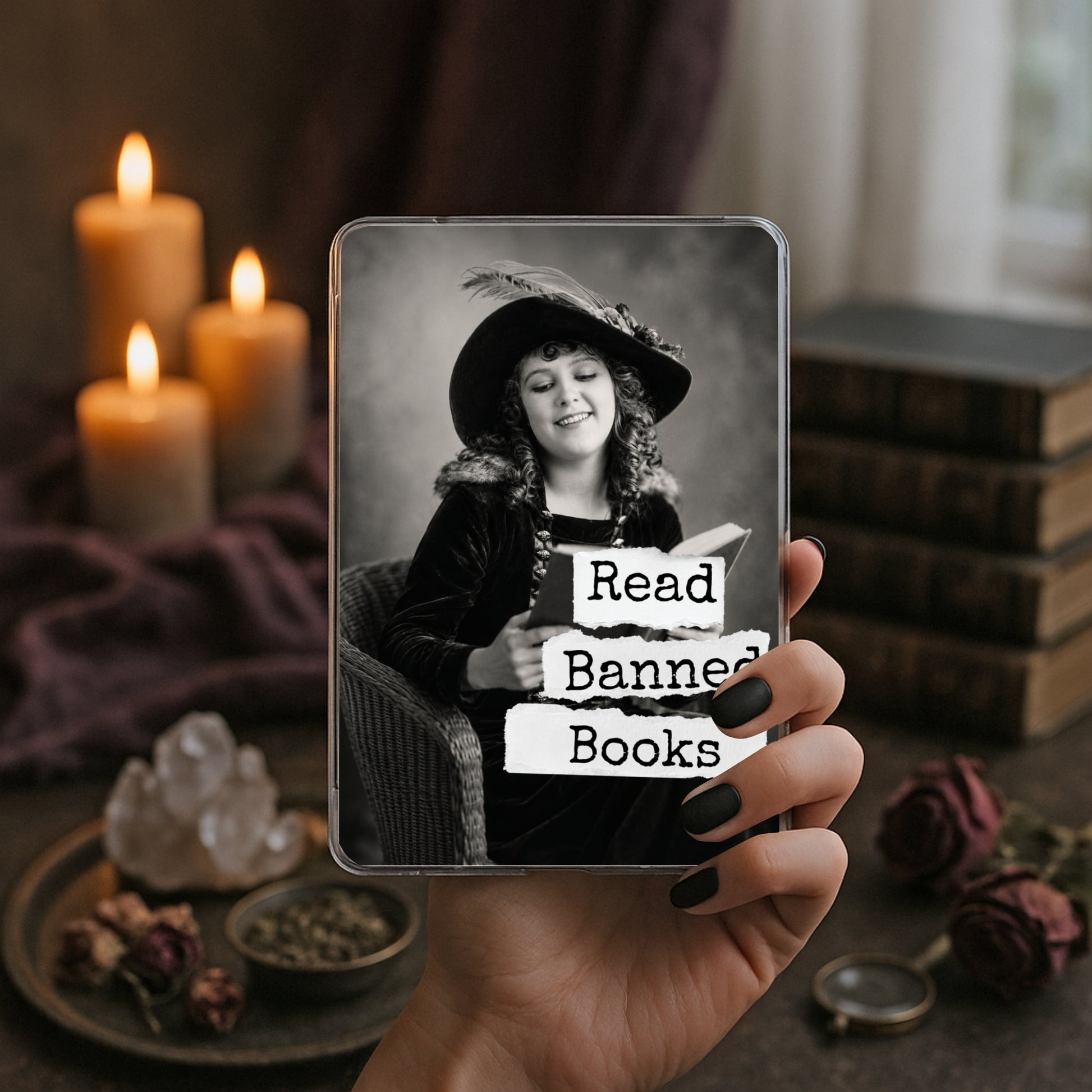 Read Banned Books printable Kindle clear case insert featuring a smiling vintage woman in a wide-brim hat reading a book, shown in a moody book-and-candle mockup.