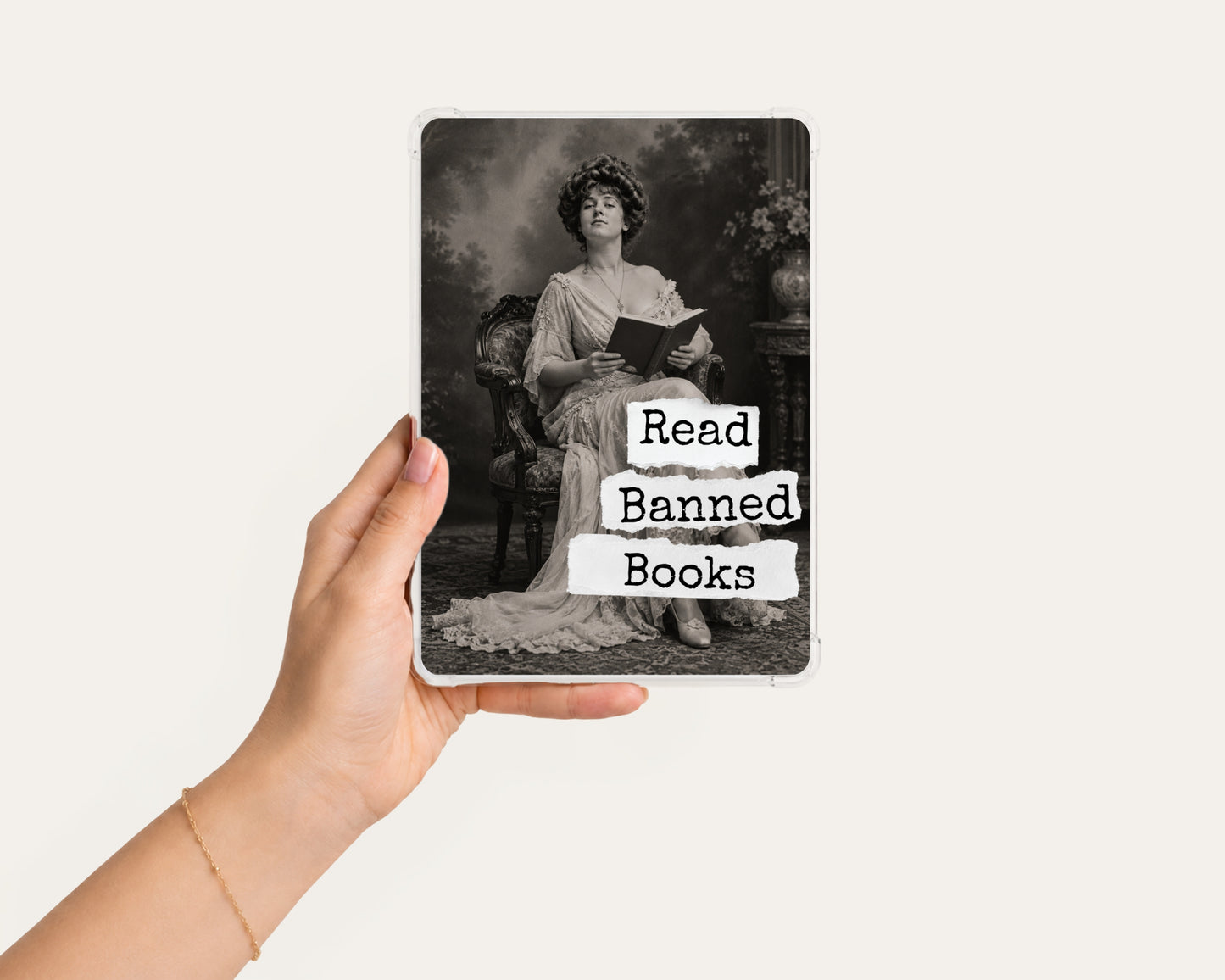 Read Banned Books printable Kindle clear case insert featuring an elegantly dressed Victorian woman seated with a book, shown in a clean hand-held mockup on a light background.