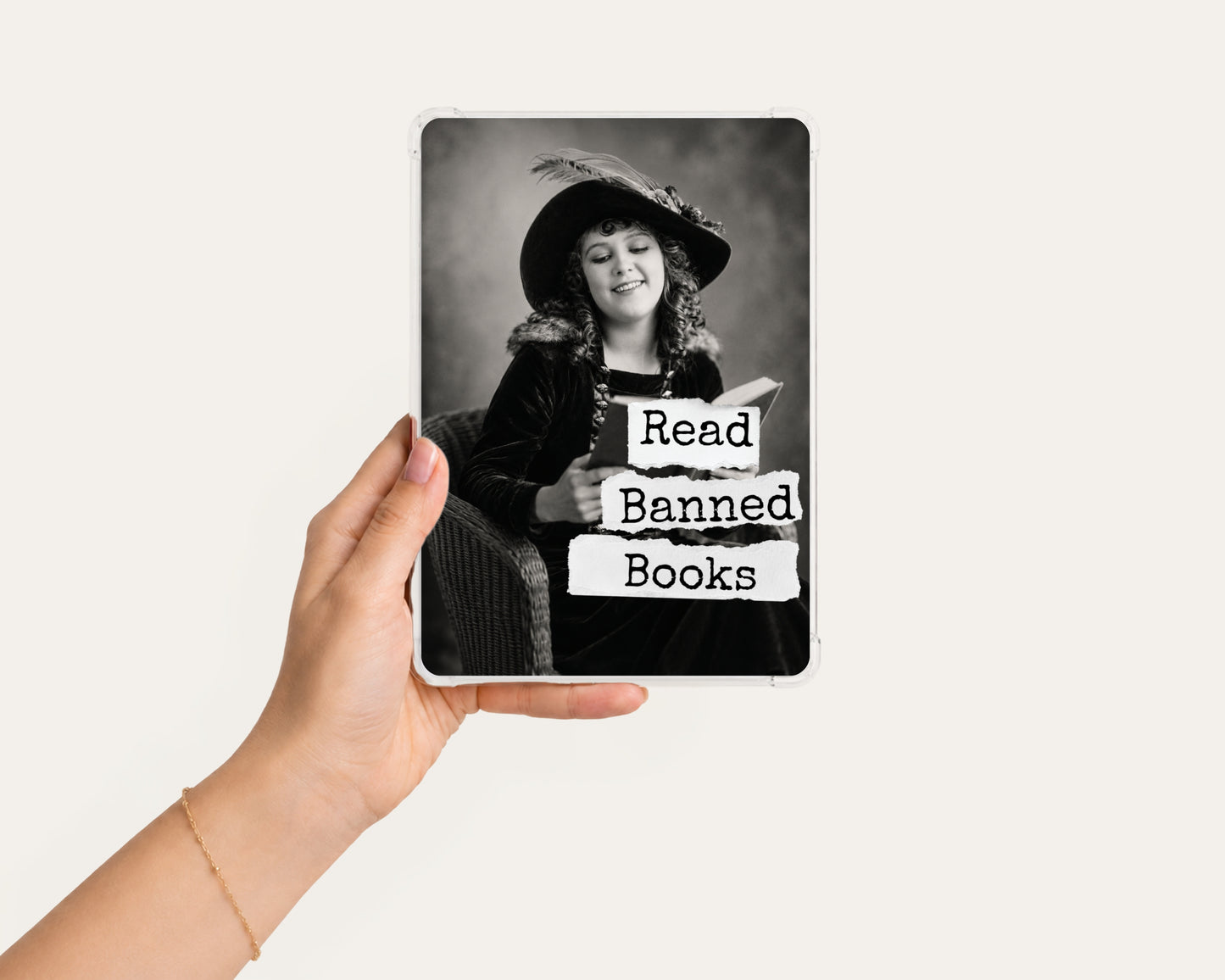 Read Banned Books printable Kindle clear case insert featuring a smiling vintage woman in a wide-brim hat reading a book, shown in a clean hand-held mockup on a light background.