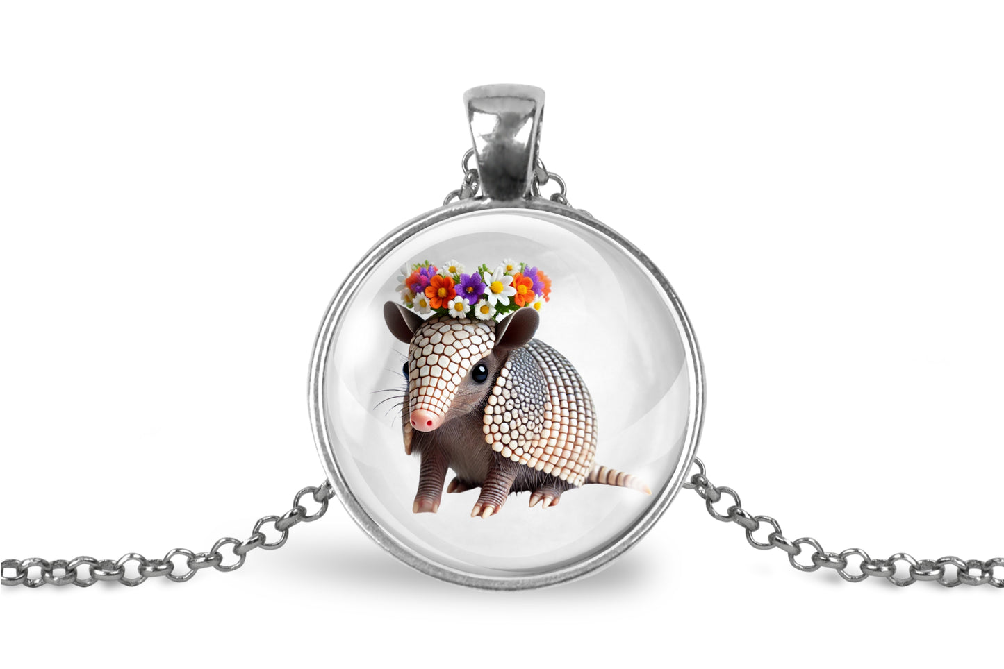 Necklace with pendant featuring an armadillo wearing a flower crown on a white background