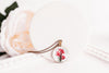 Gladiolus necklace styled with white rose, cottagecore botanical jewelry for August birthday