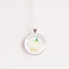 Honeysuckle birth flower necklace – glass cabochon pendant on silver-tone chain, white background