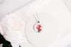Gladiolus pendant on white plate with rose, silver-tone glass cabochon birth flower necklace
