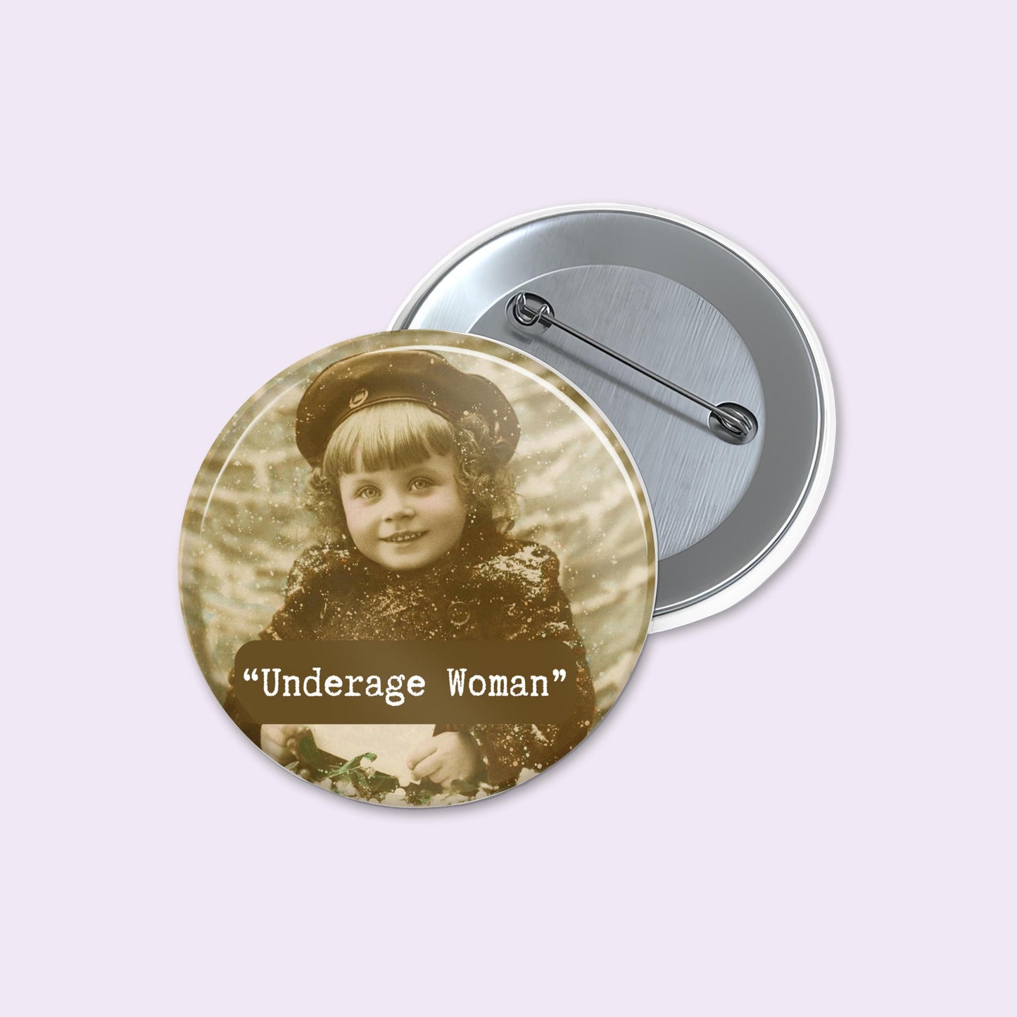 Button badge with vintage photo of a young girl and text 'Underage Woman' on a light purple background