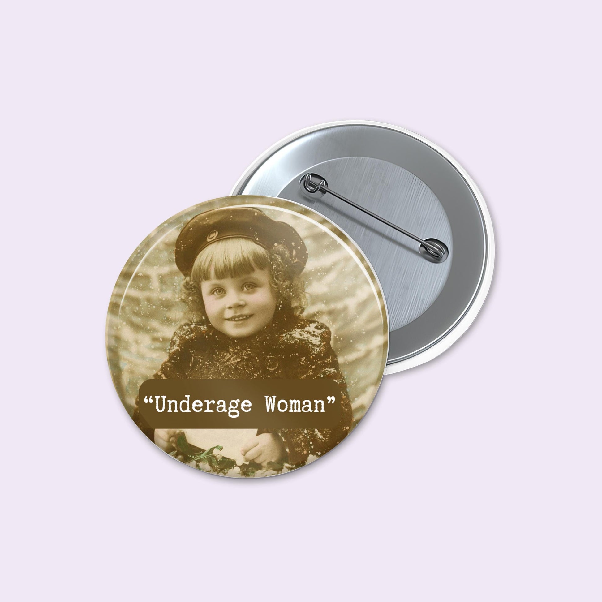 Button badge with vintage photo of a young girl and text 'Underage Woman' on a light purple background