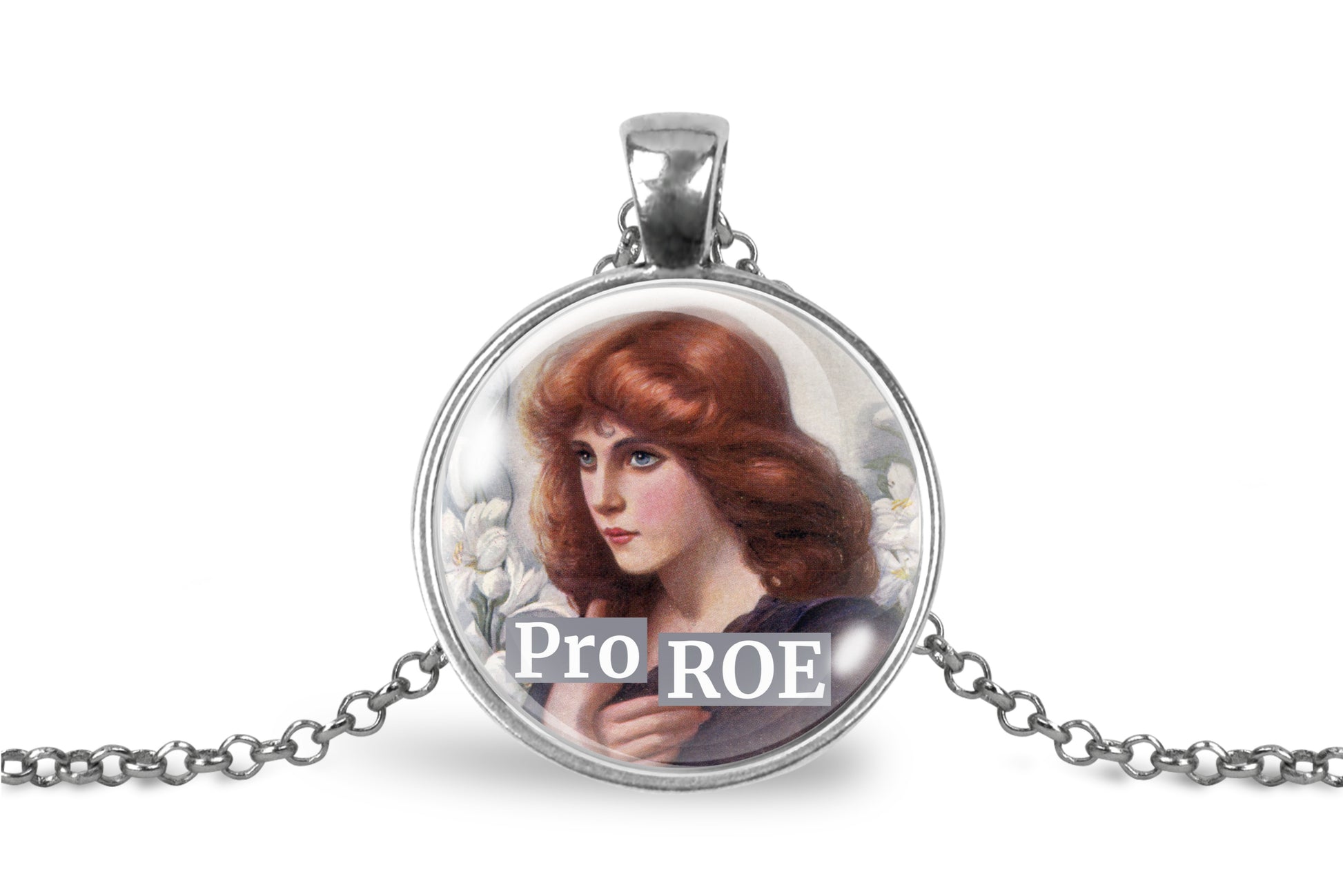 A silver pendant necklace featuring a circular glass dome with an illustration of a woman with red hair and the text 'Pro ROE' overlaid, shown on a white background with a silver chain.