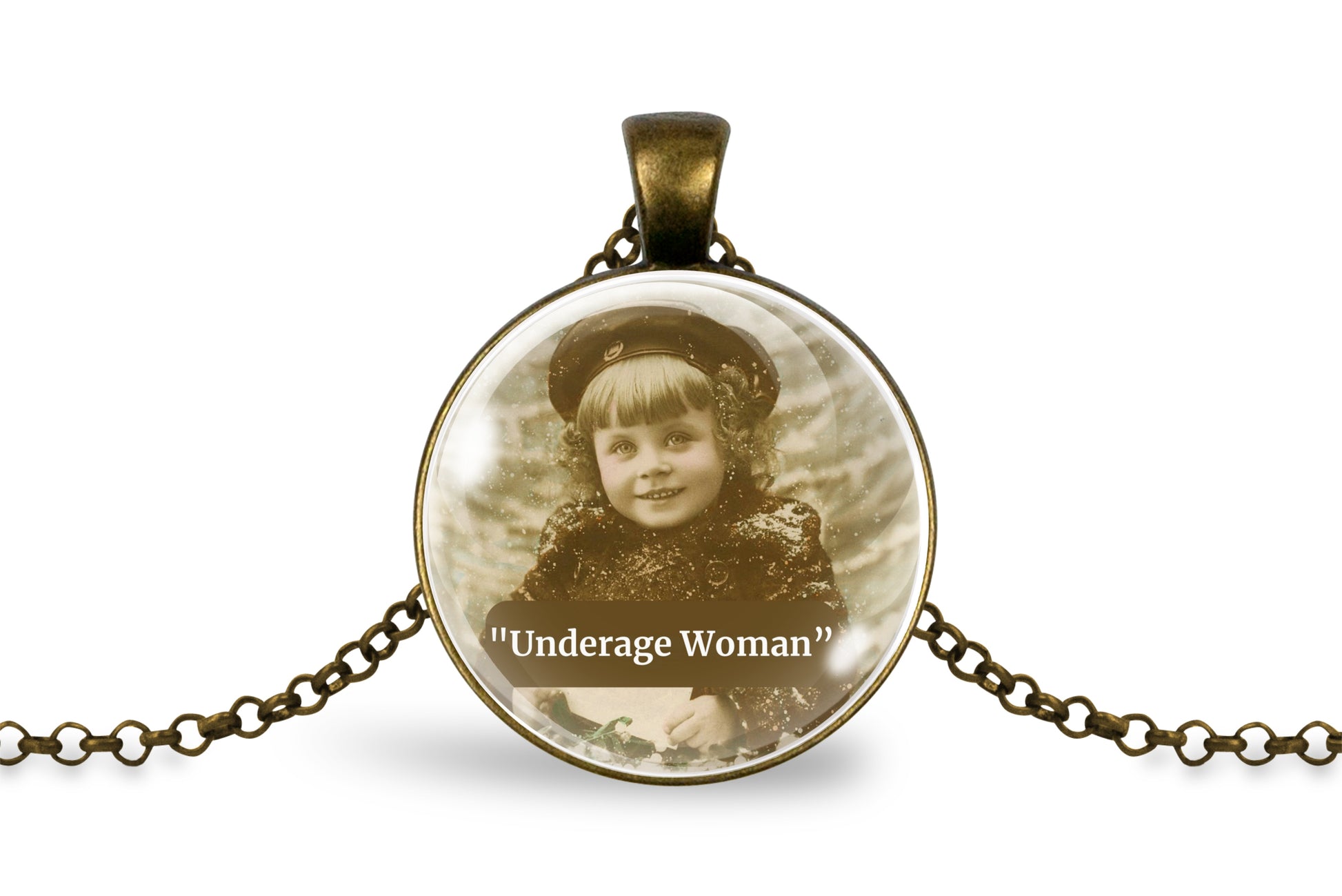 A round pendant necklace with an antique bronze metal frame and chain, featuring a sepia-toned vintage photograph of a young child with the text '"Underage Woman"' printed below the image.