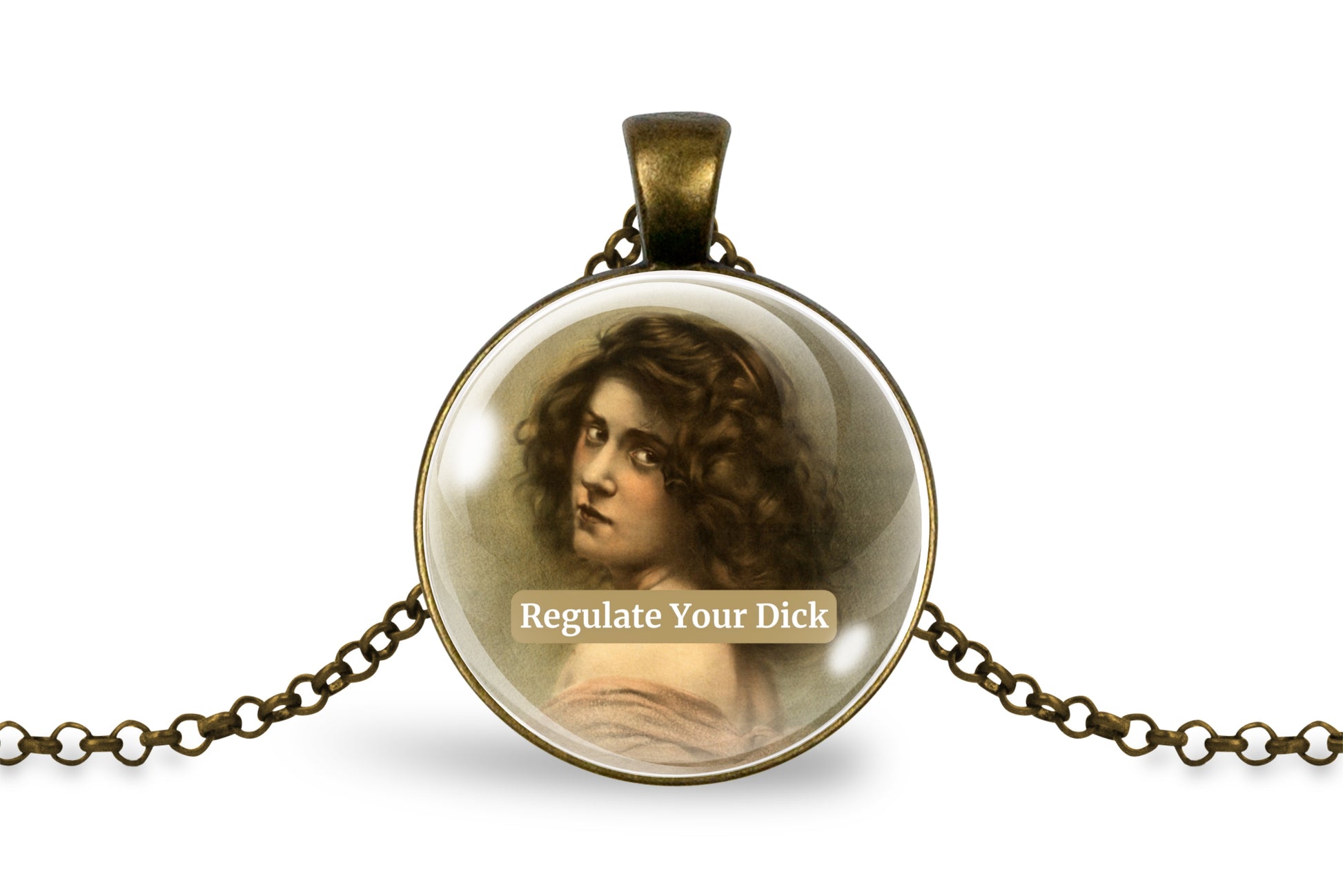 Product photo of a 1-inch glass cabochon pendant necklace featuring “Regulate Your Dick” with a sepia portrait of a curly-haired vintage woman on a 20-inch chain.