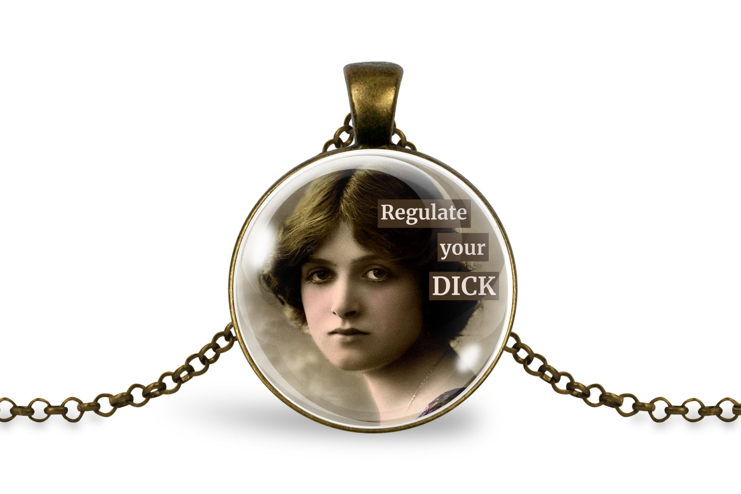 A round pendant necklace with an antique bronze metal frame and chain, featuring a vintage-style portrait of a woman inside the pendant with the text 'Regulate your DICK' overlaid on the image.