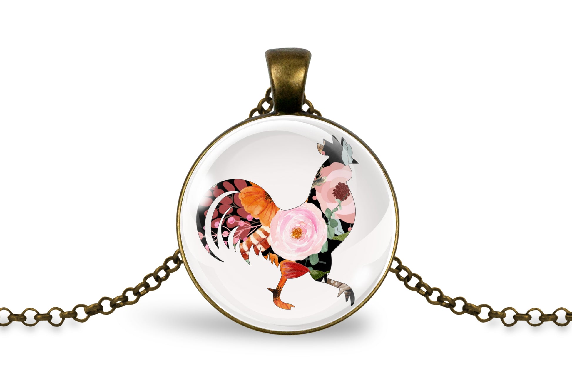 Necklace with a round pendant featuring a colorful rooster and floral design on a white background.