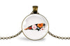 Walrus floral silhouette necklace, glass cabochon pendant, arctic wildlife botanical
