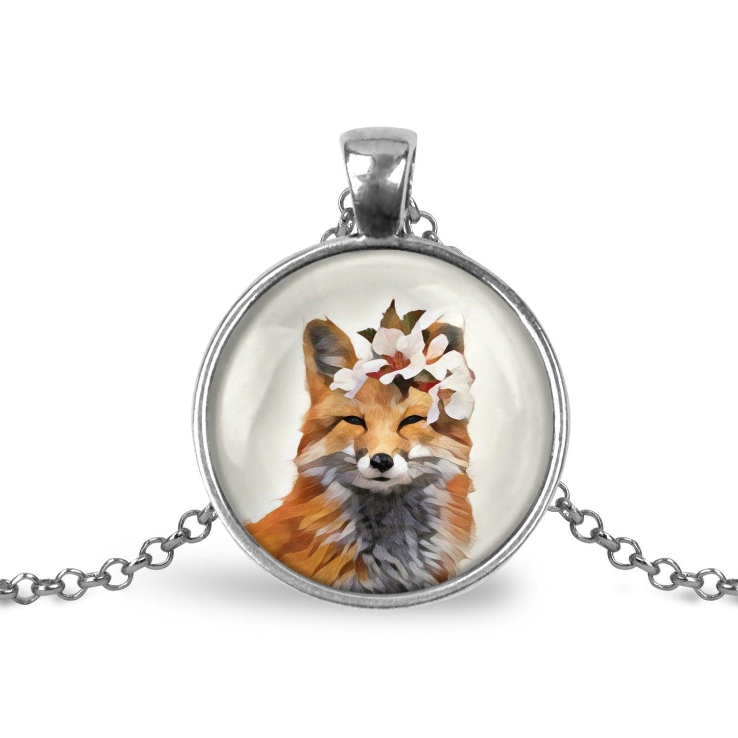 Silver-toned round pendant necklace an image of a fox wearing a flower crown against a white background